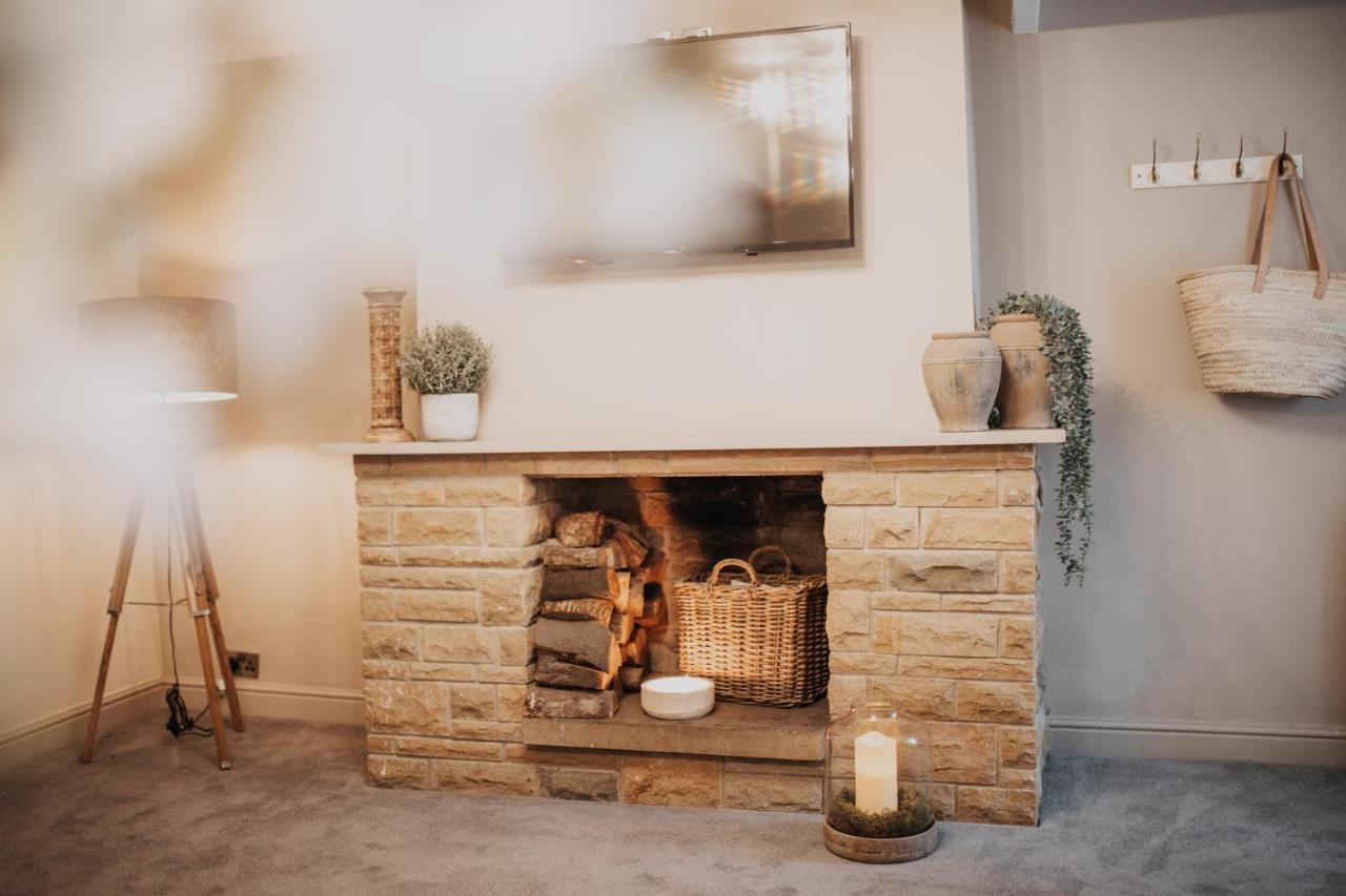 The Woodman Inn Huddersfield Exterior photo The fireplace at The Old Post Office